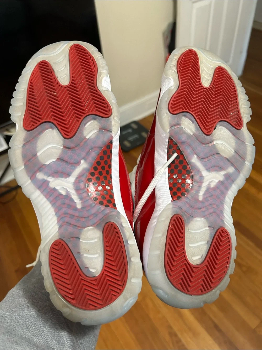 Jordan 11 Retro Low Top Sneakers in Red and White